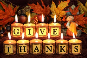 Give-Thanks-Candles-with-Cute-Pilgrim-iStock-000017351486Large